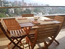 Large Balcony Over Looking El Poblado Medellin with beautiful table